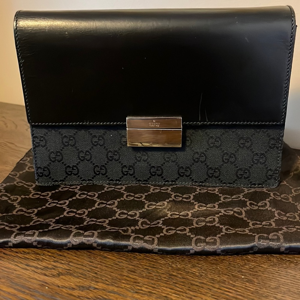 Authentic Gucci Leather & Canvas Clutch Bag with hidden wristlet